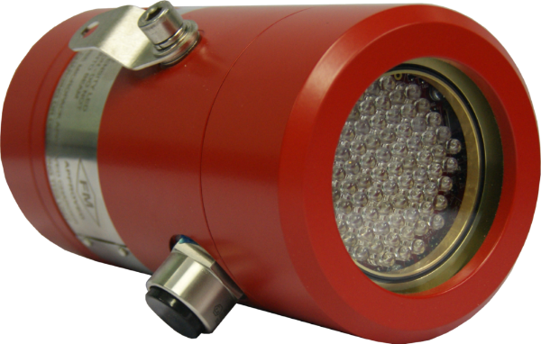 A cylindrical red device with a metal clamp and grid-like pattern on one end, resembling an industrial sensor or detector.